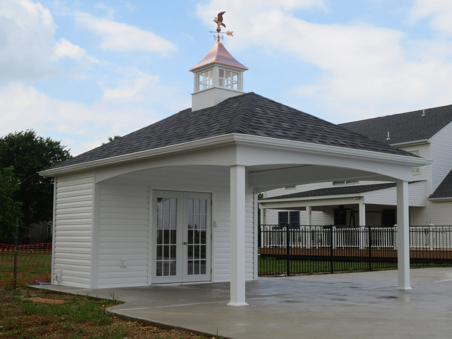 White gazebo with a cupola on a clear day