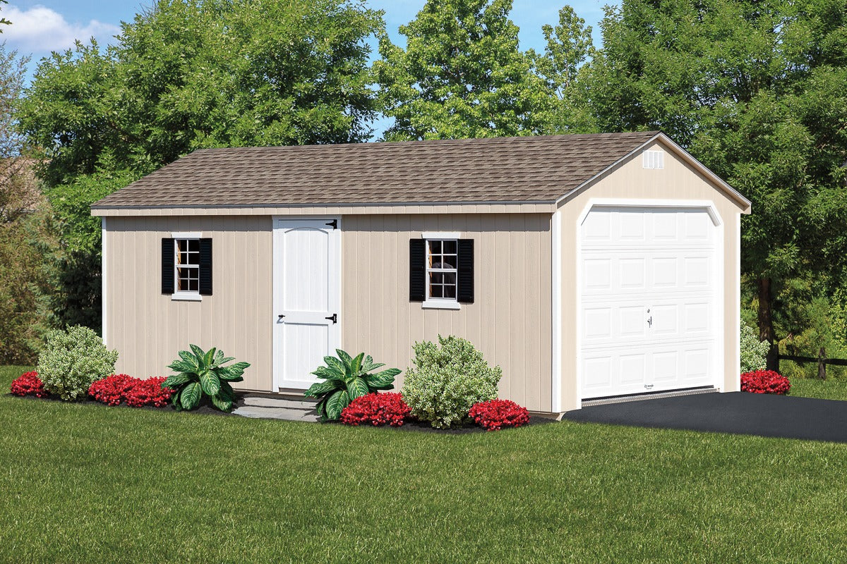 Two-car garage with beige exterior and white doors, surrounded by greenery and flowers.