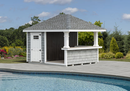 Gazebo with a bar attached next to a pool on a sunny day.