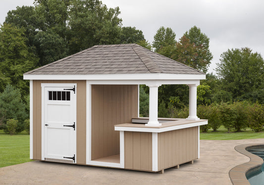 Wooden shed with a roof and white door in a garden setting